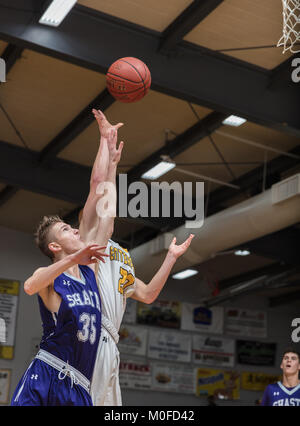 Basketball action with Shasta vs. Enterprise High School in Redding, California. Stock Photo