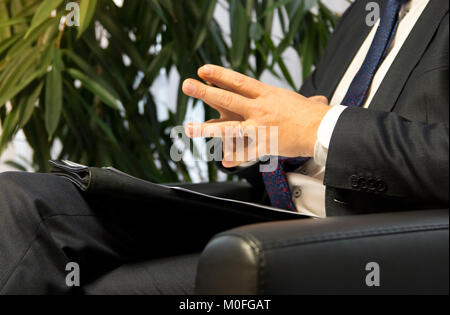 Businessman boss or politician giving interview. Stock Photo