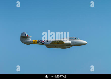 Gloster Meteor T7 flying on 27th May 2012 at Duxford, Cambridgeshire, UK Stock Photo