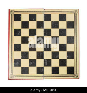 Old and worn antique chess board isolated on whote background Stock Photo