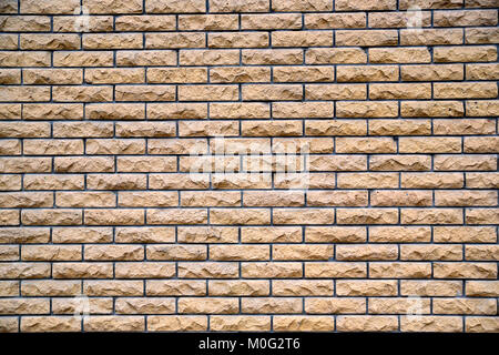 High resolution texture of part of grey beige brick wall Stock Photo