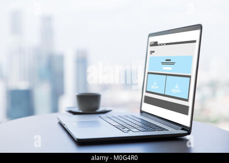 laptop with web page interface design on screen Stock Photo