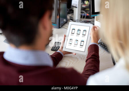 web designers with user interface on tablet pc Stock Photo