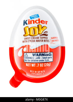 Winneconne, WI - 12 January 2018: A Kinder Joy egg with a suprise toy inside on an isolated background. Stock Photo