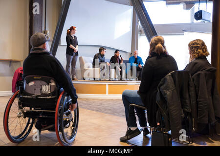 Seattle, Washington, USA. 21st Jan, 2018. Film producers Luke Sieczek, Caryn Cline and Rod Huntress (seated l-to-r) take questions at the Impact Hub after the screening of their documentary films about the 2017 Woman’s March on Seattle. Credit: Paul Christian Gordon/Alamy Live News Stock Photo