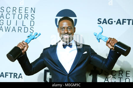 Los Angeles, USA. 21st Jan, 2018. Sterling K. Brown, winner of the awards for outstanding performance by a male actor in a drama series for 'This Is Us' and for outstanding performance by an ensemble in a drama series for 'This Is Us' poses for photos at the 24th annual Screen Actors Guild (SAG) Awards at the Shrine Auditorium in Los Angeles, California, the United States, Jan. 21, 2018. Credit: Li Ying/Xinhua/Alamy Live News Stock Photo