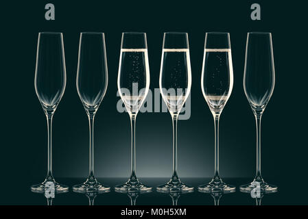 three transparent glasses with champagne and three empty glasses on black Stock Photo