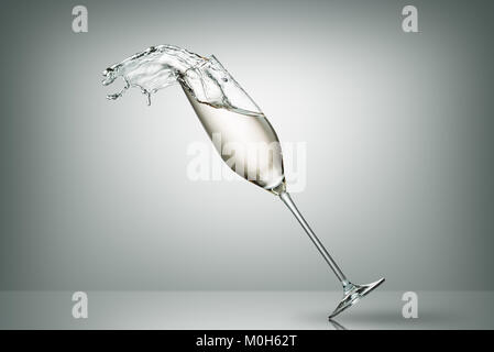 splash of champagne from falling glass on white Stock Photo