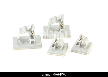 Closed up Round Releasable Cable Clamps on white background Stock Photo