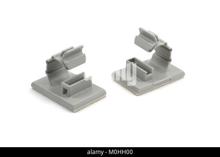 Closed up Round Releasable Cable Clamps on white background Stock Photo