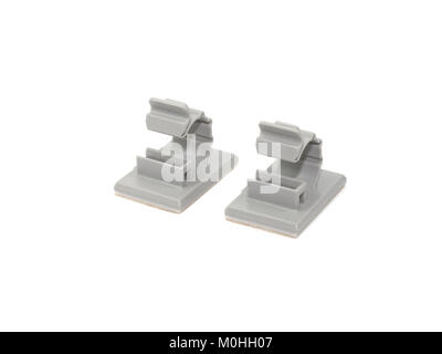 Closed up Round Releasable Cable Clamps on white background Stock Photo