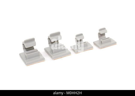 Closed up Round Releasable Cable Clamps on white background Stock Photo