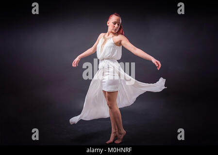 Red haired ballerina Stock Photo