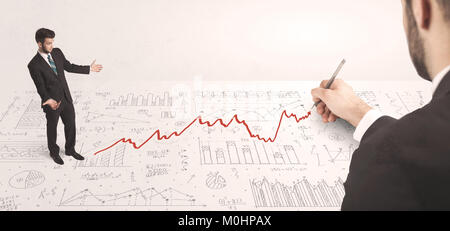 Business man looking at red arrow drawn by a hand concept on background Stock Photo