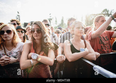 Young woman are lined up in front of the stage during the concert with the Israeli musician and singer Asaf Avidan who performed at the Czech festival Colours of Ostrava. Czech Republic 2013. Stock Photo