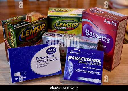 A selection of cold and flu remedies. Including  Paracetamol tablets, multivitamins  and Lemsip Max Stock Photo