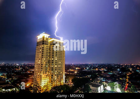 Lightning strike over a building in Jakarta, Indonesia Stock Photo