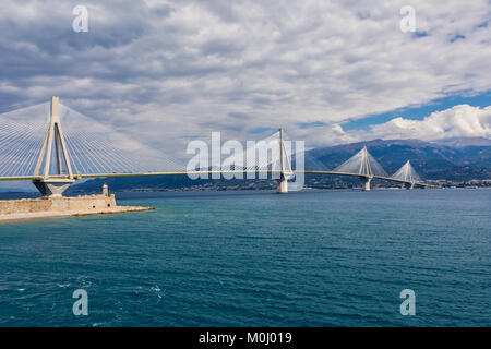 View of suspension bridge Rio-Antirio in Greece. Bridge crossing Corinth Gulf strait, Peloponnese, Greece Stock Photo