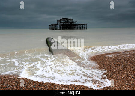 Dramatic skies over the ruined West pier, Brighton & Hove, East Sussex, England, UK Stock Photo