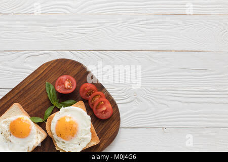 fried eggs on toasts Stock Photo