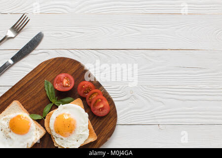 fried eggs on toasts Stock Photo