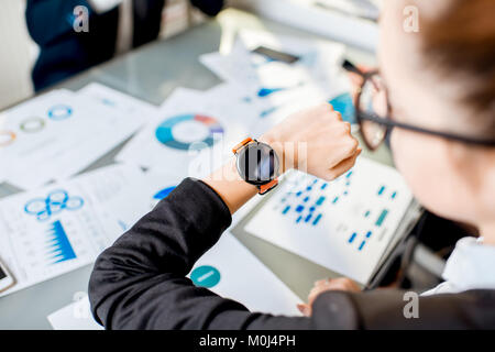 Businesswoman with smart watch Stock Photo
