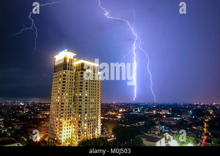 Lightning strike over a building in Jakarta, Indonesia Stock Photo