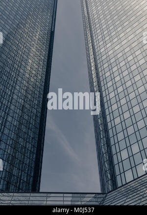 Deutsche Bank skyscraper twin towers, view up from street level, Frankfurt, Germany Stock Photo