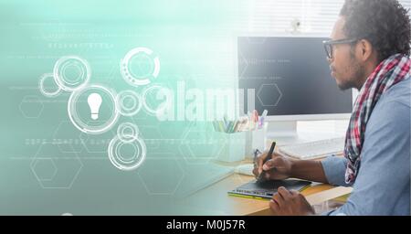 Business man using graphic tablet with graph overlays Stock Photo