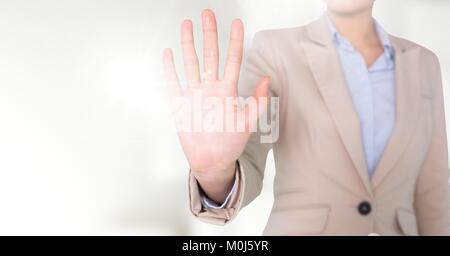 Hand interacting with bright background Stock Photo