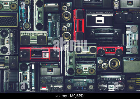 Vintage wall full of radio boombox of the 80s Stock Photo