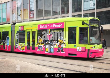 FRANKFURT, GERMANY - DECEMBER 6, 2016: People ride an electric tram in Frankfurt, Germany. The trams are operated by VerkehrsGesellschaft Frankfurt am Stock Photo
