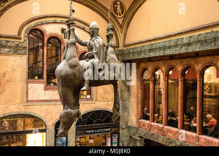 Statue of King Wenceslas Riding an Upside-Down Dead Horse by Prague artist David Cerny in the Lucerna Palace Gallery Stock Photo