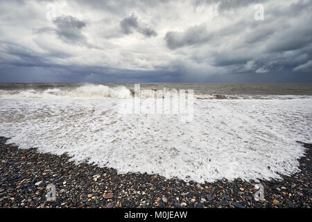 Dark clouds and stormy Black Sea in Batumi, Georgia Stock Photo