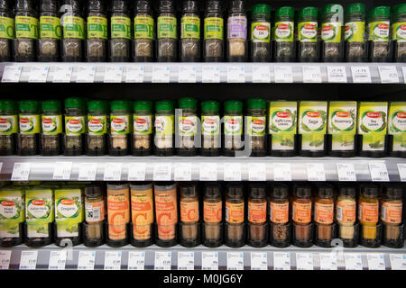 Herbs and spices by Schwartz on display on a supermarket shelf. Stock Photo