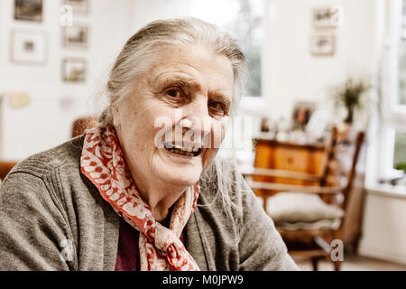 Senior citizen in her room in a senior citizen's home, portrait, Jan Tepass, North Rhine-Westphalia, Germany Stock Photo