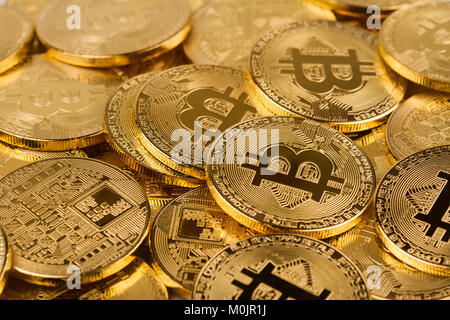 horizontal top view pile of many golden bitcoins background texture Stock Photo