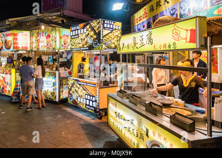 TAIPEI, TAIWAN - MAY 20: Street food vendors in the famous Shilin night market, a popular travel destination in Taipei on May 20, 2017 in Taipei Stock Photo