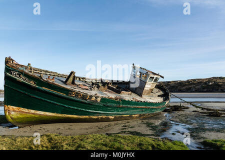 Old wrecked fishing boat on the Donegal Coast in Ireland Stock Photo