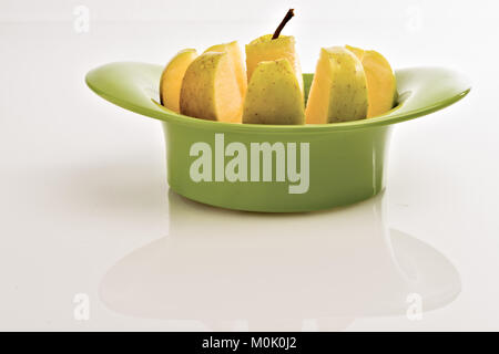 apple cut into wedges from below Stock Photo