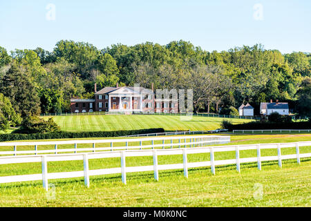 Montpelier Station, USA - October 20, 2017: Historic home of James Madison called Montpelier in Virginia, white picket fence Stock Photo