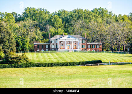 Montpelier Station, USA - October 20, 2017: Historic home of James Madison called Montpelier in Virginia, white picket fence Stock Photo