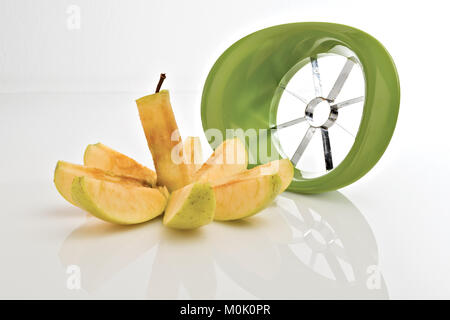 apple cut into wedges in front 2 Stock Photo