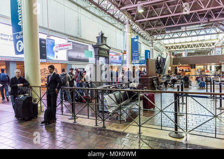 Washington DC, USA - October 27, 2017: Inside Union Station in capital city with people standing for bathroom, restroom, Amtrak train, gate Stock Photo