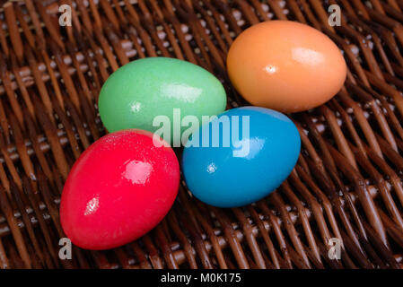 Four multicolored eggs closeup Stock Photo