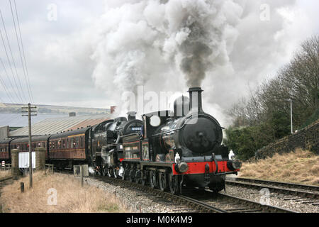 Lancashire and Yorkshire Steam Loco and Standard 4 steam loco at the Keighley and Worth Valley Railway - Keighley, West Yorkshire, UK - 14th February  Stock Photo