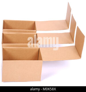 Close-up of three open cardboard boxes againt white background Stock Photo