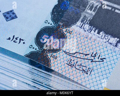 500 SAR five hundred Saudi Arabia riyals cash money banknote with pile ...
