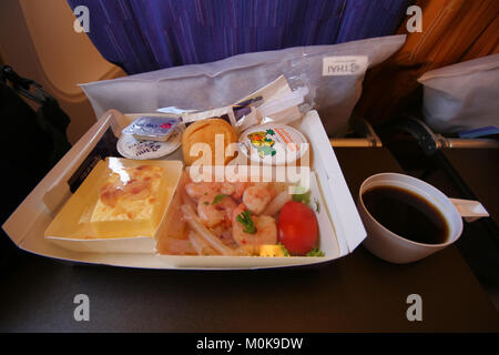 CHIANGMAI , THAILAND- MARCH 16 2009: Meal in Economy Class of Thai Airway Airbus A300-600. In Flight from Chiangmai to Phuket. Stock Photo