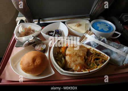 CHIANGMAI , THAILAND- MARCH 10 2007: Meal in Business Class of Boeing 777-300  Emirate Airlines. In Flight from  Bangkok to Hongkong. Stock Photo
